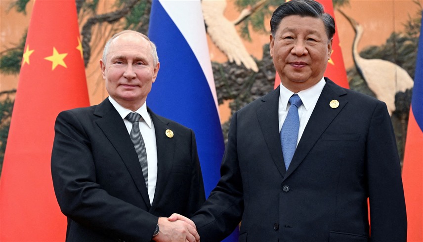 الرئيسان الروسي فلاديمير بوتين والصيني شي جين بينغ (رويترز)