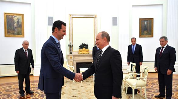 الرئيسان الروسي فلاديمير بوتين والسوري بشار الأسد في لقاء سابق(أرشيف)