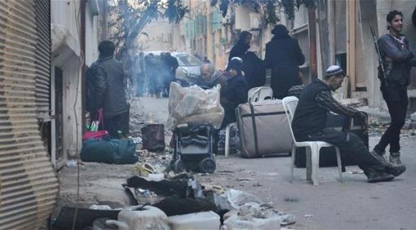 سكان حي الوعر الحمصي يستعدون لإجلاء المنطقة إلى إدلب(أرشيف)