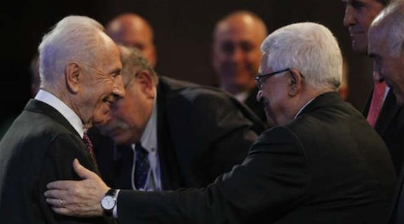 الرئيس الفلسطيني وشيمون بيريز (أرشيف)