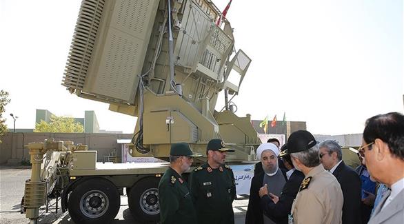 الرئيس الإيراني حسن روحاني يُشرف على حفل الكشف الرسمي عن صواريخ باور(أرشيف)