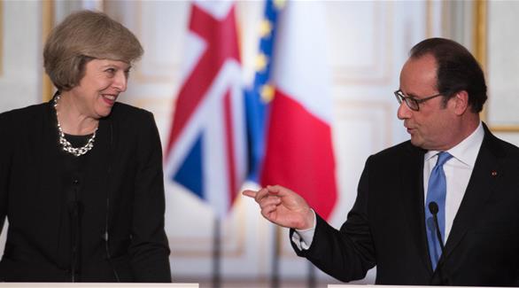الرئيس الفرنسي فرانوسا هولاند ورئيسة الوزراء البريطانية تيريزا ماي(أرشيف)