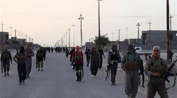 مسلحون من تنظيم داعش في شوارع الموصل (أرشيف)