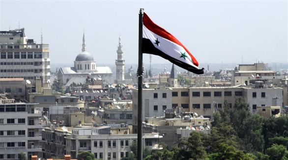 العلم السوري مرفرفاً في دمشق (أرشيف)