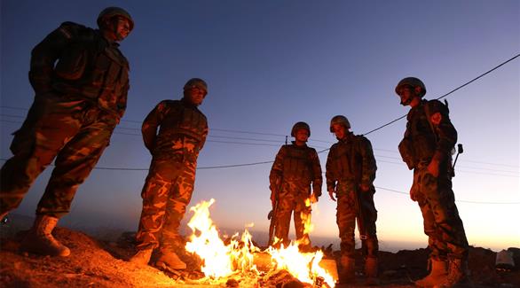 عناصر من القوات الكردية شمال الموصل استعداداً لعملية التحرير (أ ف ب)