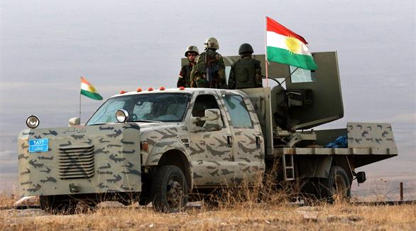 عناصر من قوات البشمركة على الحدود الشمالية للموصل (أ ف ب)