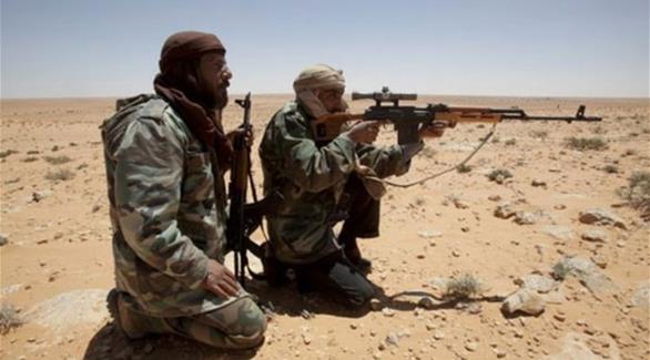 مسلحان ليبيان أثناء إحدى المعارك (أرشيف)
