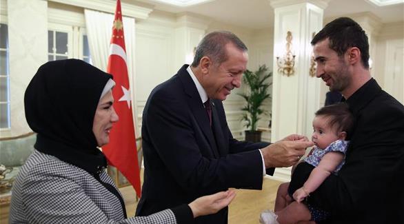 الرئيس التركي رجب طيب أردوغان أكد عقب الإفراج عن رهائن القنصلية التركية أنه لم يتم دفع فدية (أ ف ب)