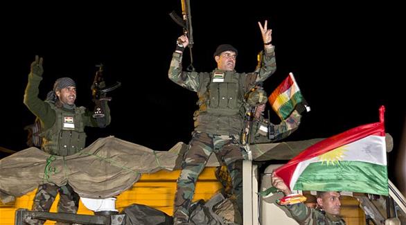 القاتلين الأكراد يدخلون مدينة كوباني عبر تركيا (أرشيف)