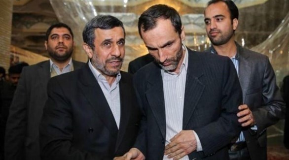 حميد بقائي مع الرئيس الإيراني السابق محمود أحمدي نجاد (أرشيف)