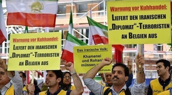 ناشطون إيرانيون يطالبون بتسليم "الدبلوماسي الإيراني-الإرهابي" إلى بلجيكا (المصدر)