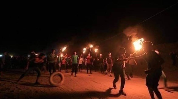 مظاهرة ليلية على حدود غزة (أرشيف)