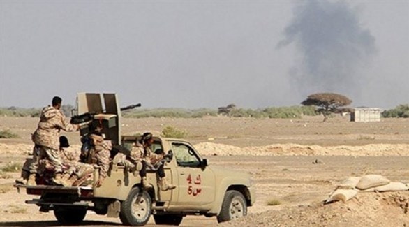 مركبة عسكرية وجنود يمنيون في الجوف (أرشيف)