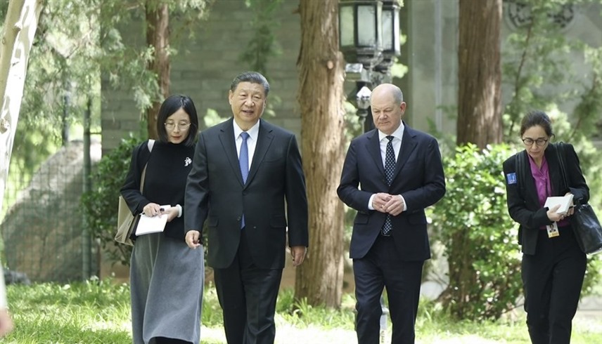 المستشار الألماني أولاف شولتس، والرئيس الصيني شي جين بينغ (إكس)