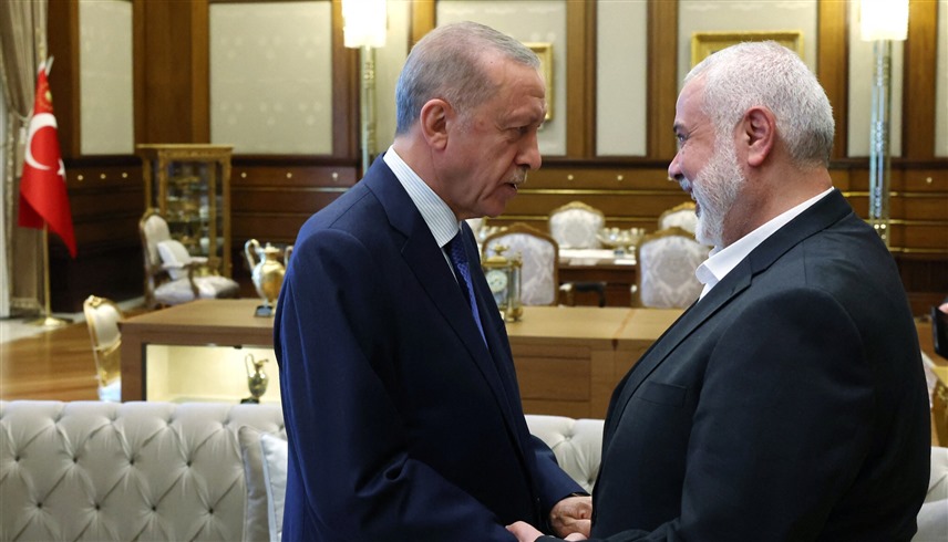 الرئيس التركي رجب طيب أردوغان ورئيس المكتب السياسي لحماس إسماعيل هنية (أرشيف)