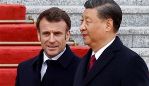 قبل زيارة شي.. ماكرون يتعهد بإشراك بكين في القضايا الدولية