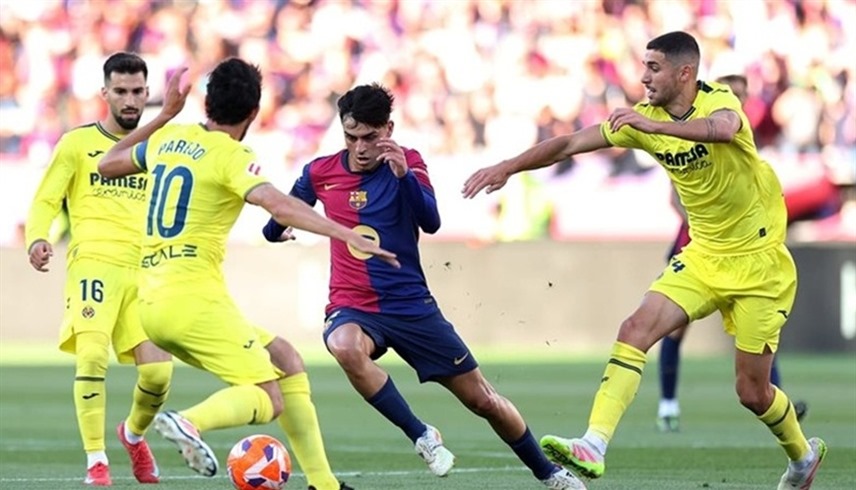 من لقاء فياريال وبرشلونة (إكس)