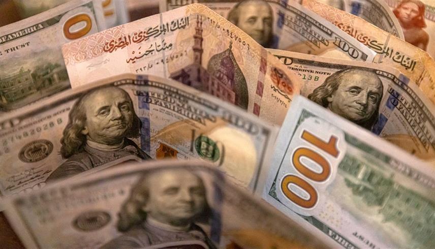 الجنيه المصري يتراجع بقوة أمام الدولار (أ ف ب)
