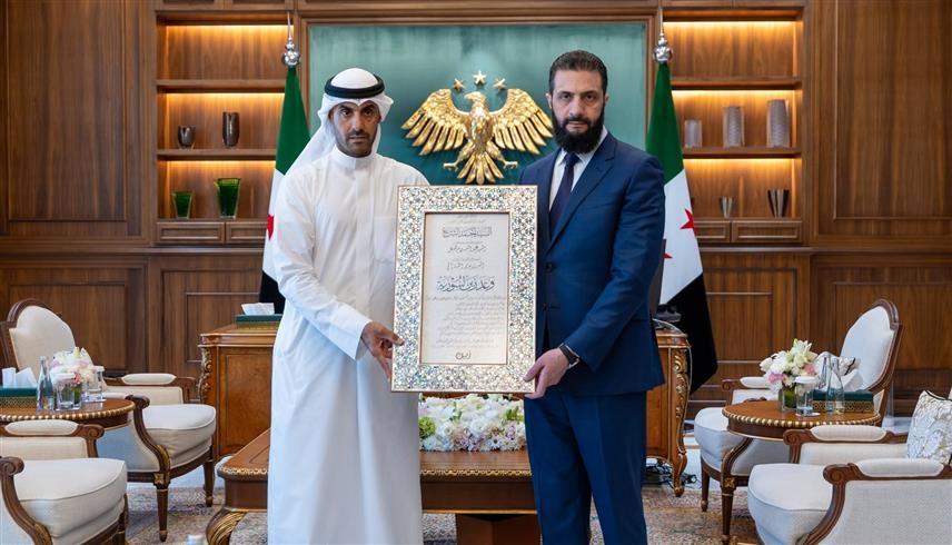 الرئيس السوري وممثل مجموعة زين الكويتية للاتصالات (سانا)