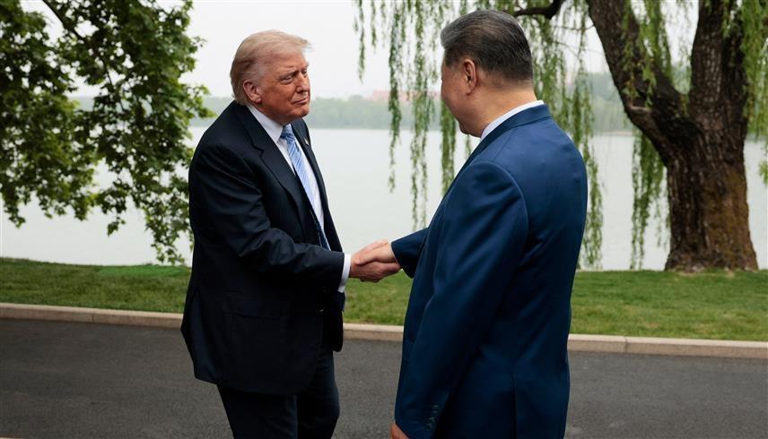 دونالد ترامب وشي جين بينغ (أ ف ب) 