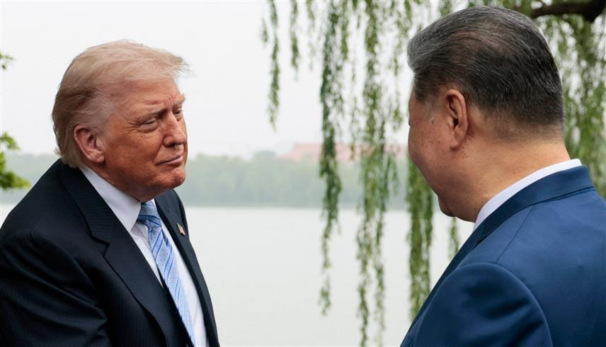 الرئيس الأمريكي دونالد ترامب ورئيس الصين شي جين بينغ (أ ف ب)