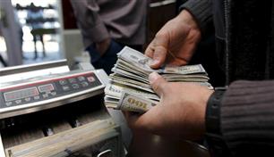بغداد: تفاهم مع واشنطن لاستمرار شحنات الدولار النقدي 