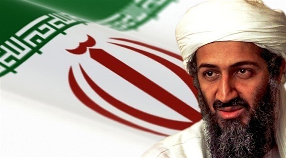 زعيم تنظيم "القاعدة" أسامة  بن لادن مع خلفية للعلم الإيراني.(أرشيف)