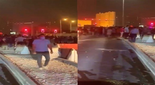 عمال يتظاهرون في قطر احتجاجاً على تأخر رواتبهم (تويتر)