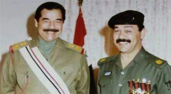 برزان عبد الغفور  إلى جانب الرئيس العراقي السابق صدام حسين (أرشيف)