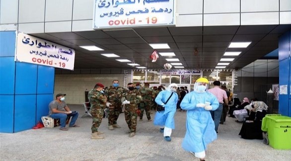 عراقيون في مستشفى لفحص كورونا (أرشيف)