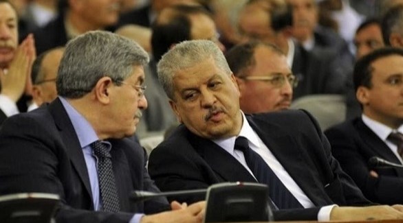 الوزيران الأولان الجزائريان السابقان أحمد أويحيى و عبد المالك سلال (أرشيف)