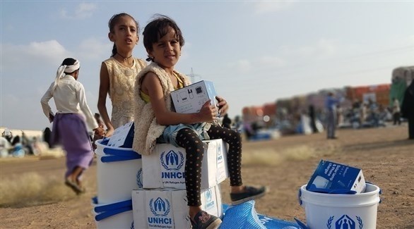 أطفال اليمن بالقرب من مساعدات مقدمة من الأمم المتحدة (أرشيف)