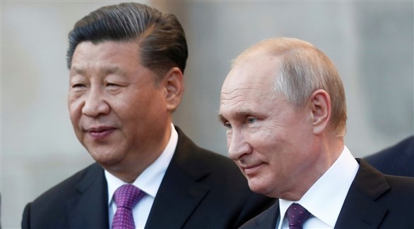الرئيس الروسي فلاديمير بوتين ونظيره الصيني تشي جي بينغ (أرشيف)