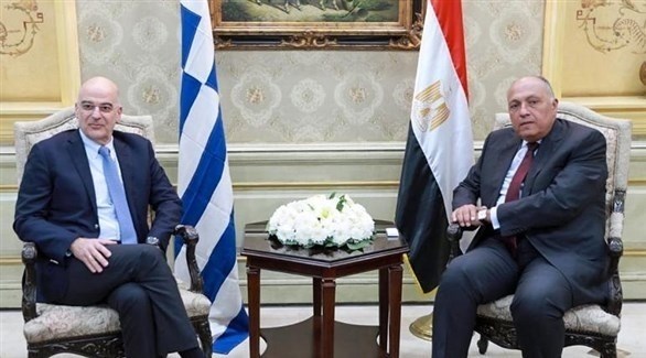 وزير الخارجية المصري سامح شكري، في لقاء سابق مع نظيره اليوناني نيكوس ديندياس (أرشيف)
