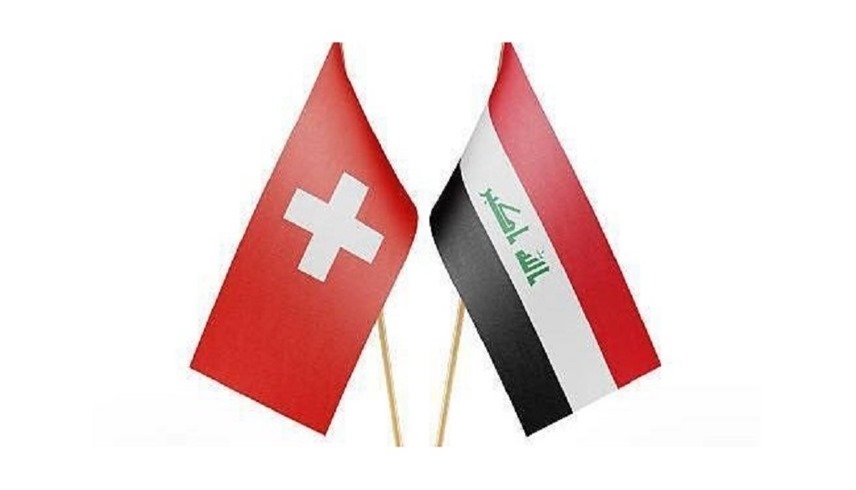 علما العراق وسويسرا (أرشيف)